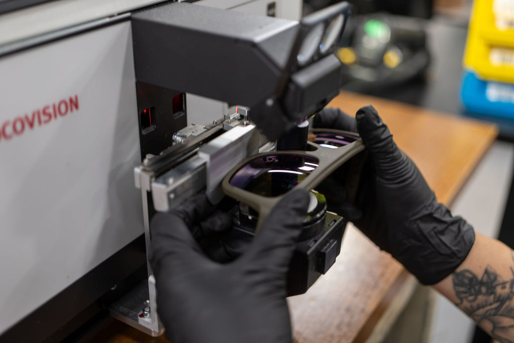 Lenses being placed into the marking station